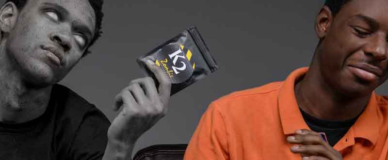 Healthy male teen rejecting K2 Zombie packet from zombie